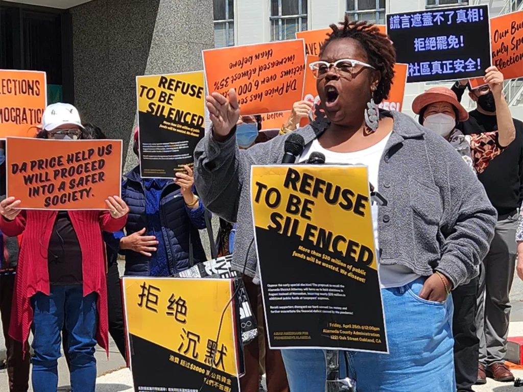 Pecolia Manigo of Oakland Rising Action speaks at the “Refuse to be Silenced” rally hosted by Asian Americans for Progressive Alameda (AAPA) at the Alameda County Administration Building in Oakland on Friday. (Kiley Russell/Bay City News)